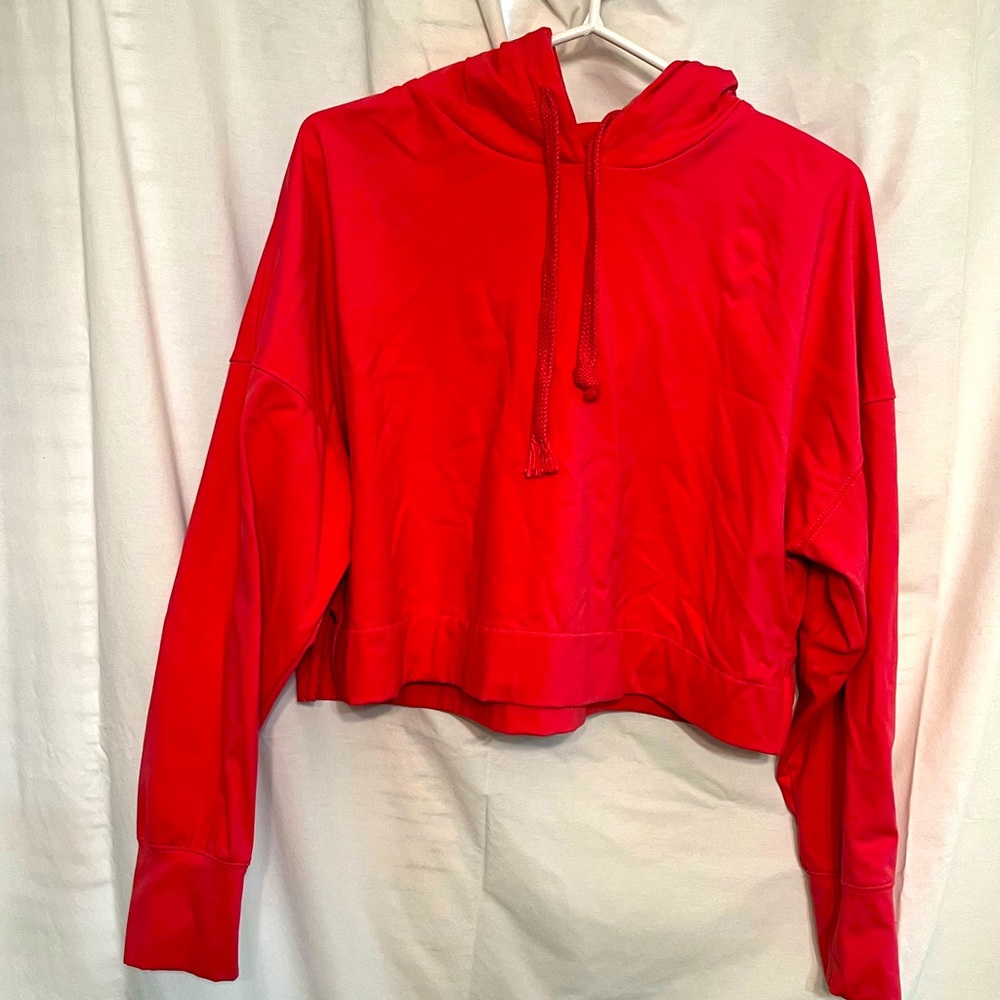 An athletic activewear hooded fashion sweatshirt can be worn in various settings